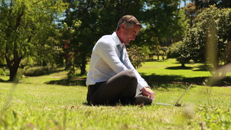 businessman working in the park