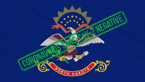 north dakota us state swaying flag with green stamp of freedom from coronavirus, loop