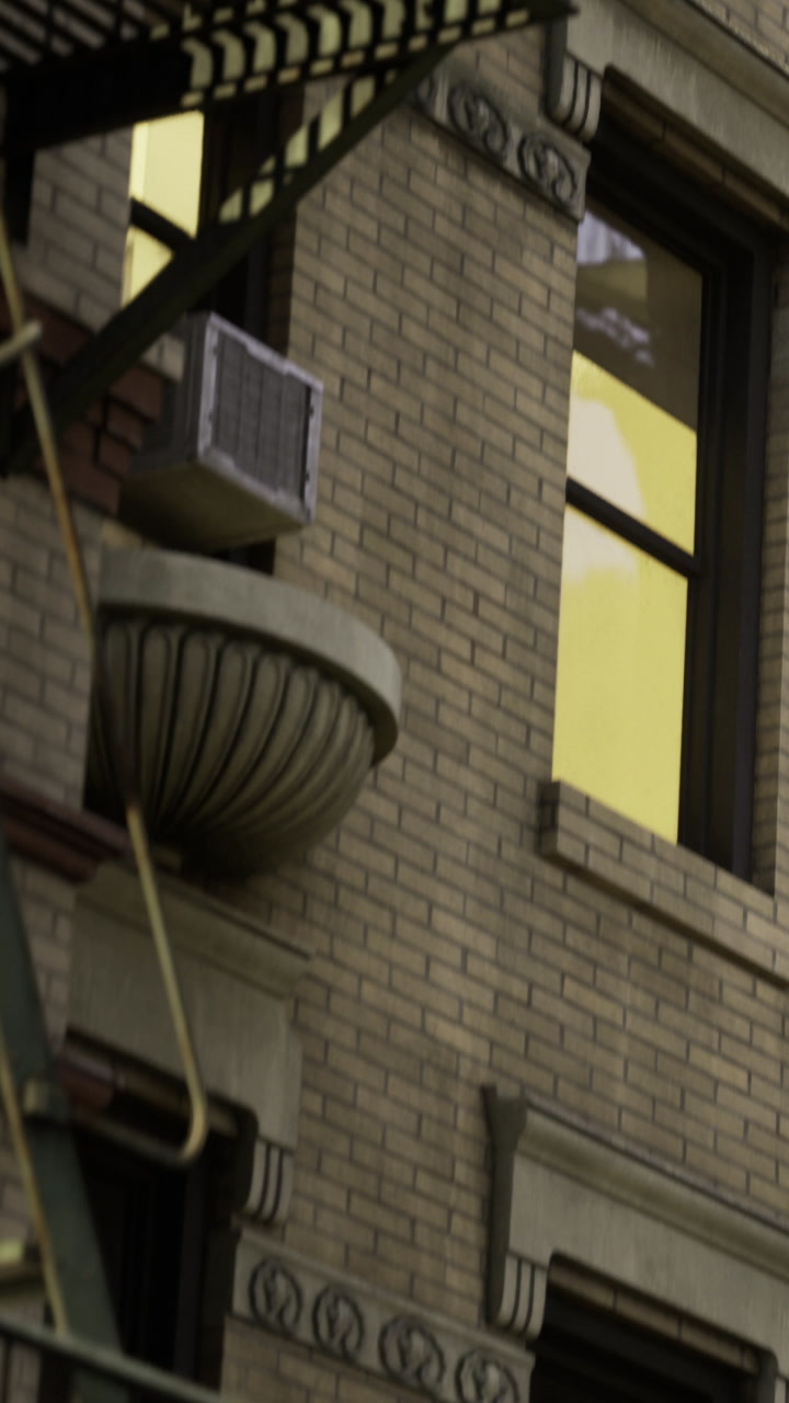 Fire escape outside building on a street in a city during daytime