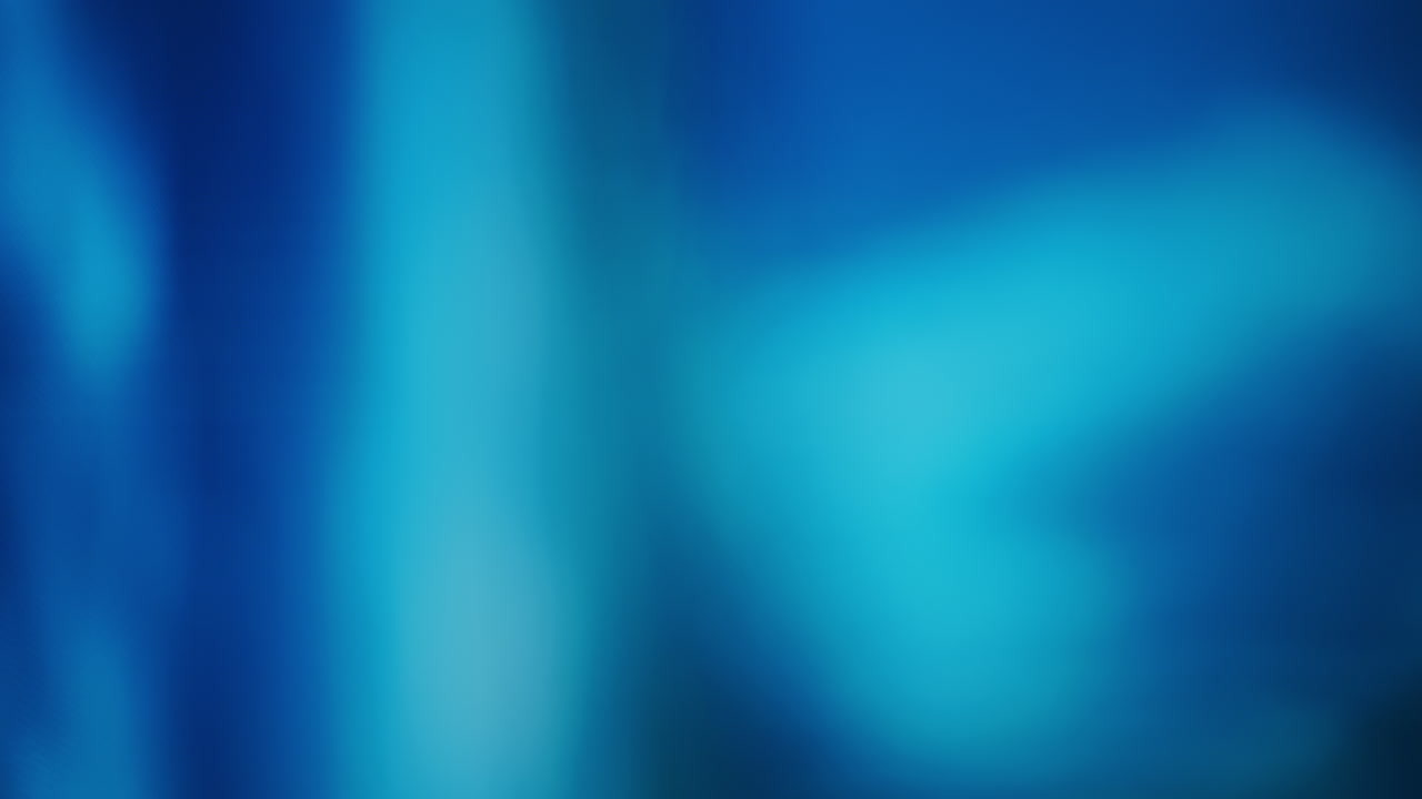 Abstract Blue and Cyan Shifting Light Background Loop