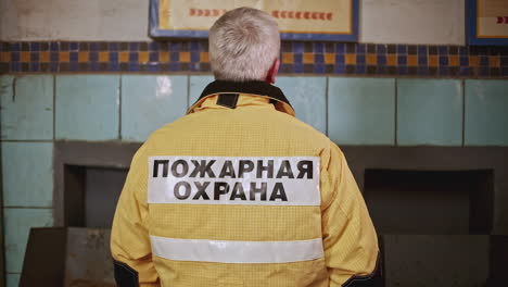 firefighter inspecting a building