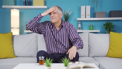 old man with headache.