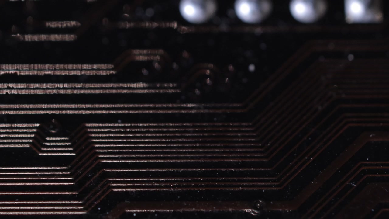 Eletronic circuits board with gold conectors. PCB board macro video.
