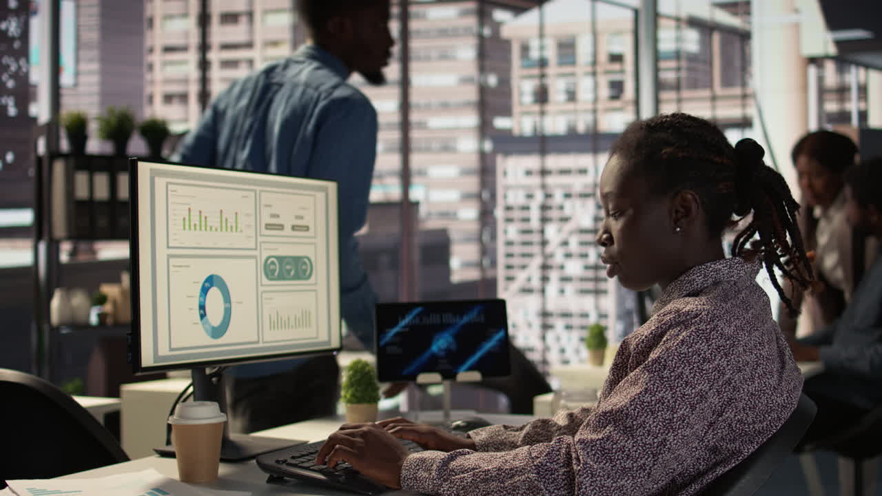 African American Woman Working in Modern Office