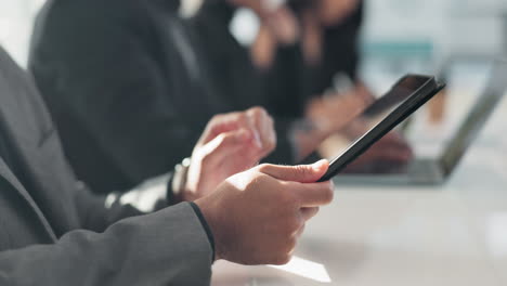 Hands-of-businessman-at-meeting-in-office