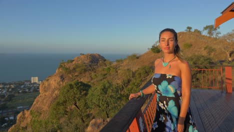 female tourist on lookout platform on castle hill townsville, queensland, australia