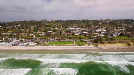 aerial view of del mar beach with foamy waves in san diego, california, usa