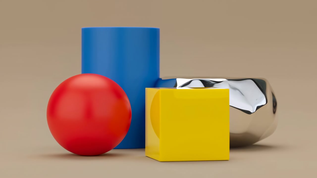Esfera vermelha, cilindro azul, cubo amarelo dispostos em superfície de estúdio bege com seixo cromado, produto em close-up