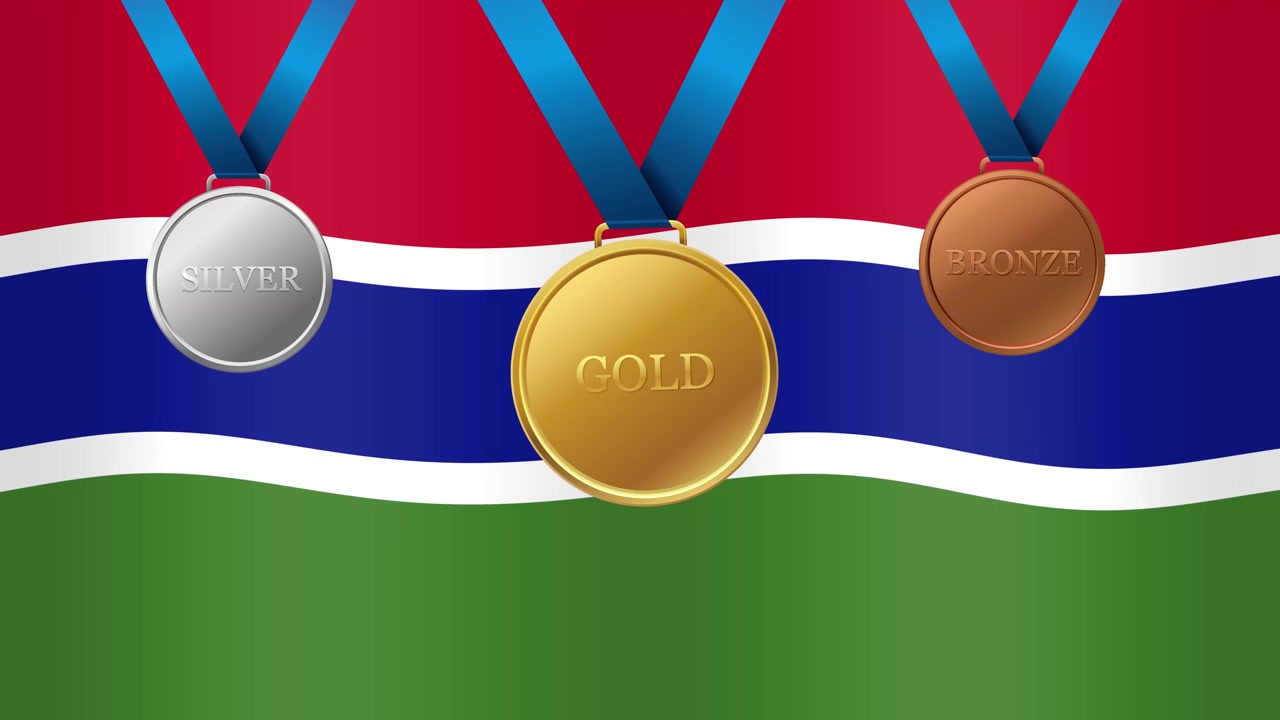 Guld-, silver- och bronsmedaljer mot Gambias vajande flagga