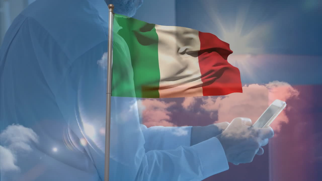 Waving Italian flag over person using smartphone with sun and clouds in background