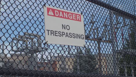 Danger-No-Trespassing-sign-on-wired-fence-at-an-Electric-Sub-Station---Blacksburg