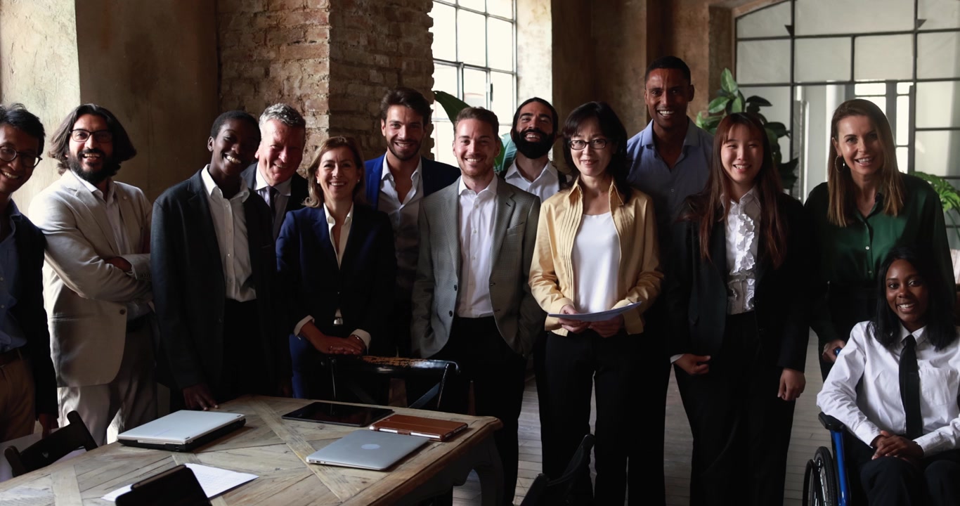Diverse Group of Professional Colleagues Posing for a Team Photo in Office