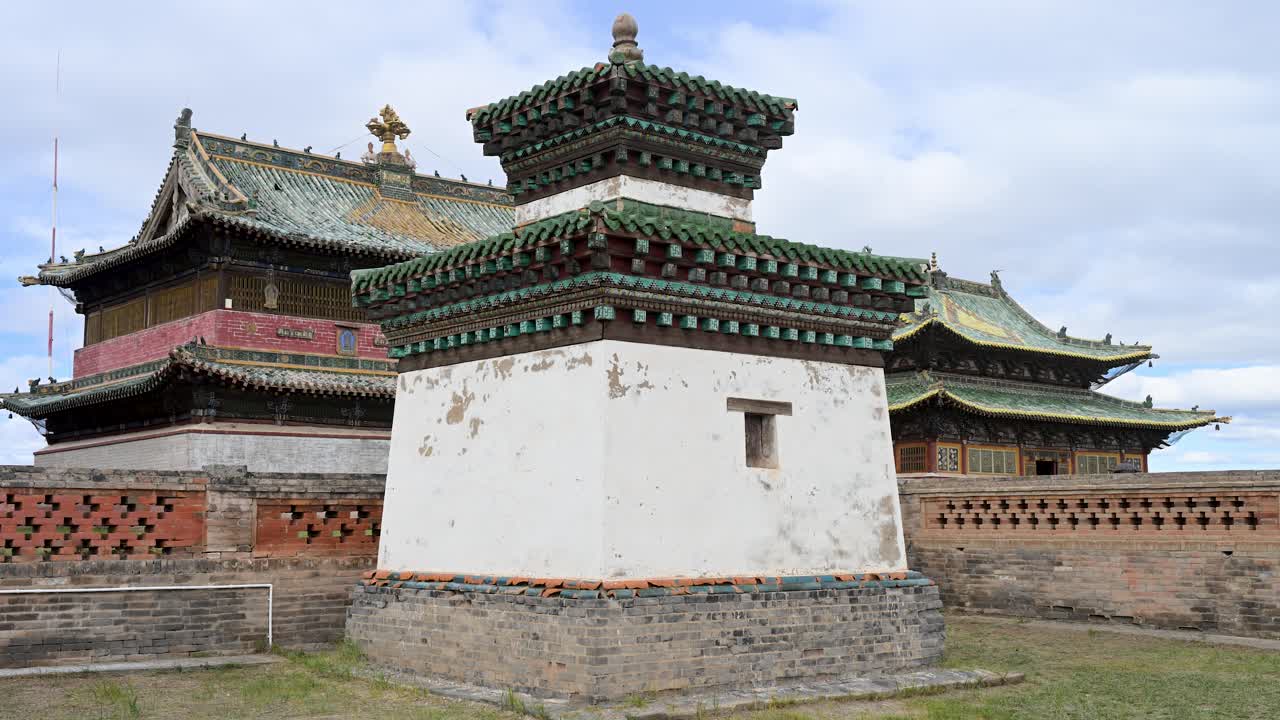 A historic shrine stands at Erdene Zuu, Mongolia's oldest monastery. The 16th-century pavilion displays ornate green tiles and traditional design, preserving ancient religious artistry