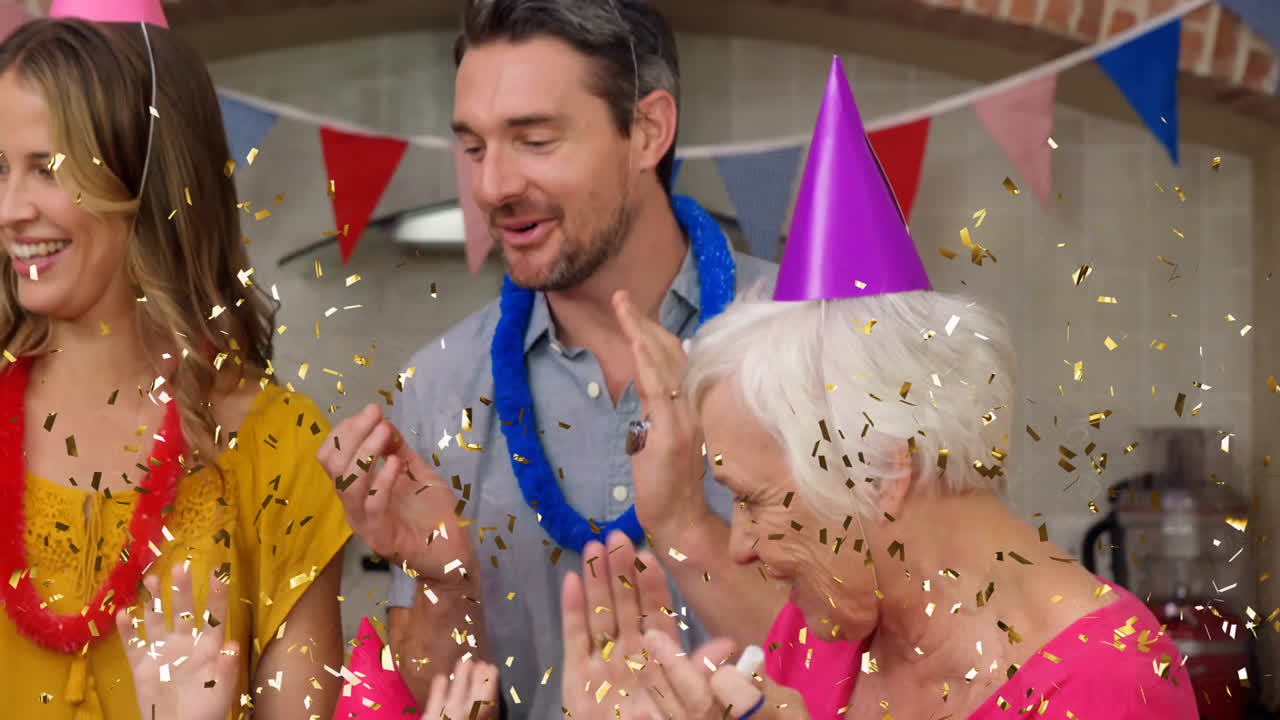 Confetti animation over people celebrating at party with colorful hats