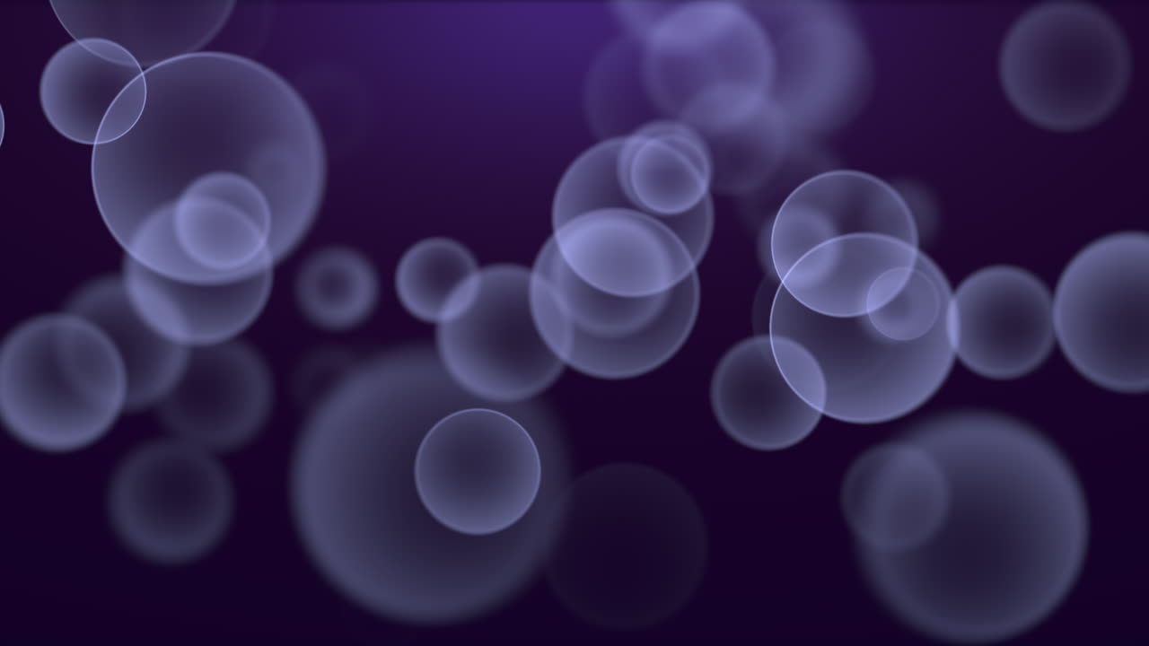 Motion and fly purple particles and round bokeh on dark background