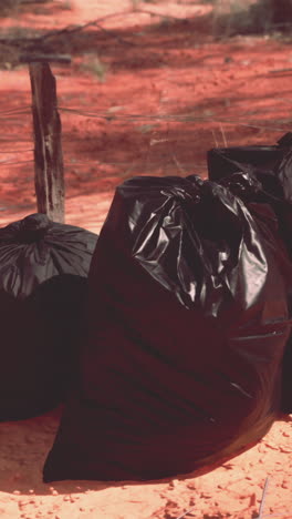 garbage bags on the ground