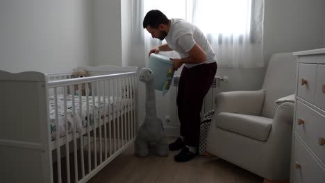 parent organizing the baby's room by arranging the stuffed animals