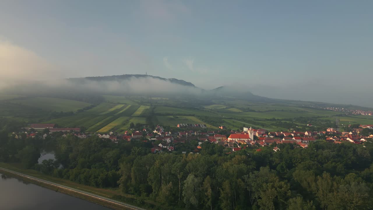 Aerial View of a Picturesque Village Nestled in the Mountains