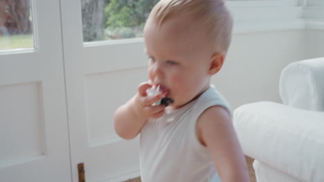 funny-baby-wearing-moustache-pacifier-happy-toddler-sucking-on-dummy-having-fun-cute-infant-enjoying-silly-humor-at-home-4k