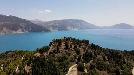 picturesque mountain top on peninsula asos in kefalonia, greece, cinematic drone