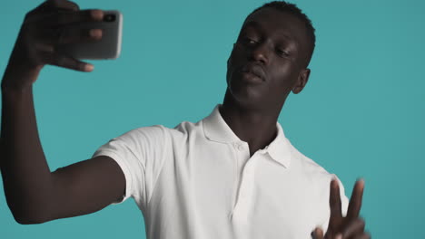 african american man on blue background.