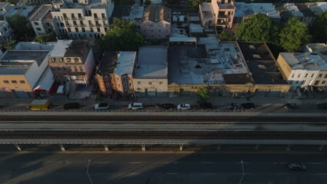 aerial view of an elevated railway track in brooklyn. shot on a summer morning in new yorkcity