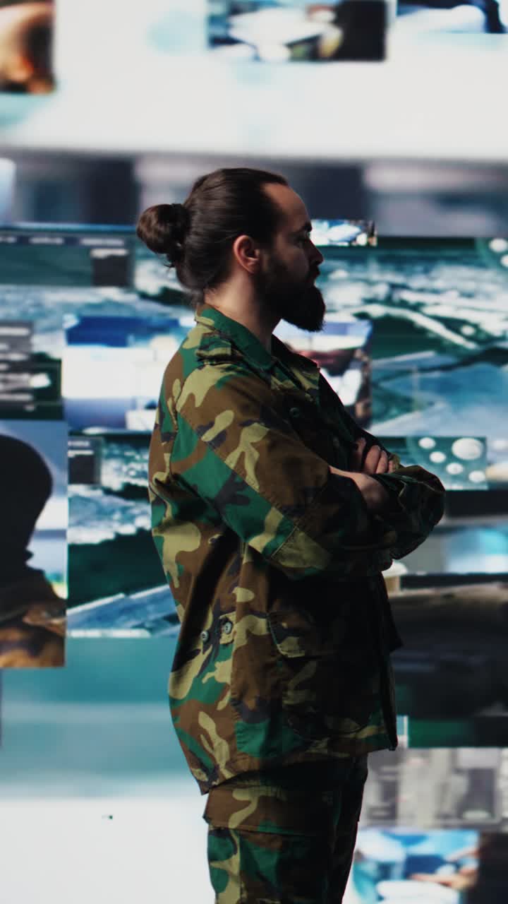 Vertical Video Military personnel monitoring drone and satellite imagery to gather data