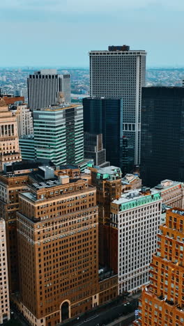 complex of beautiful buildings standing close to each other. diverse skyscrapers in new york at sunset. top view.