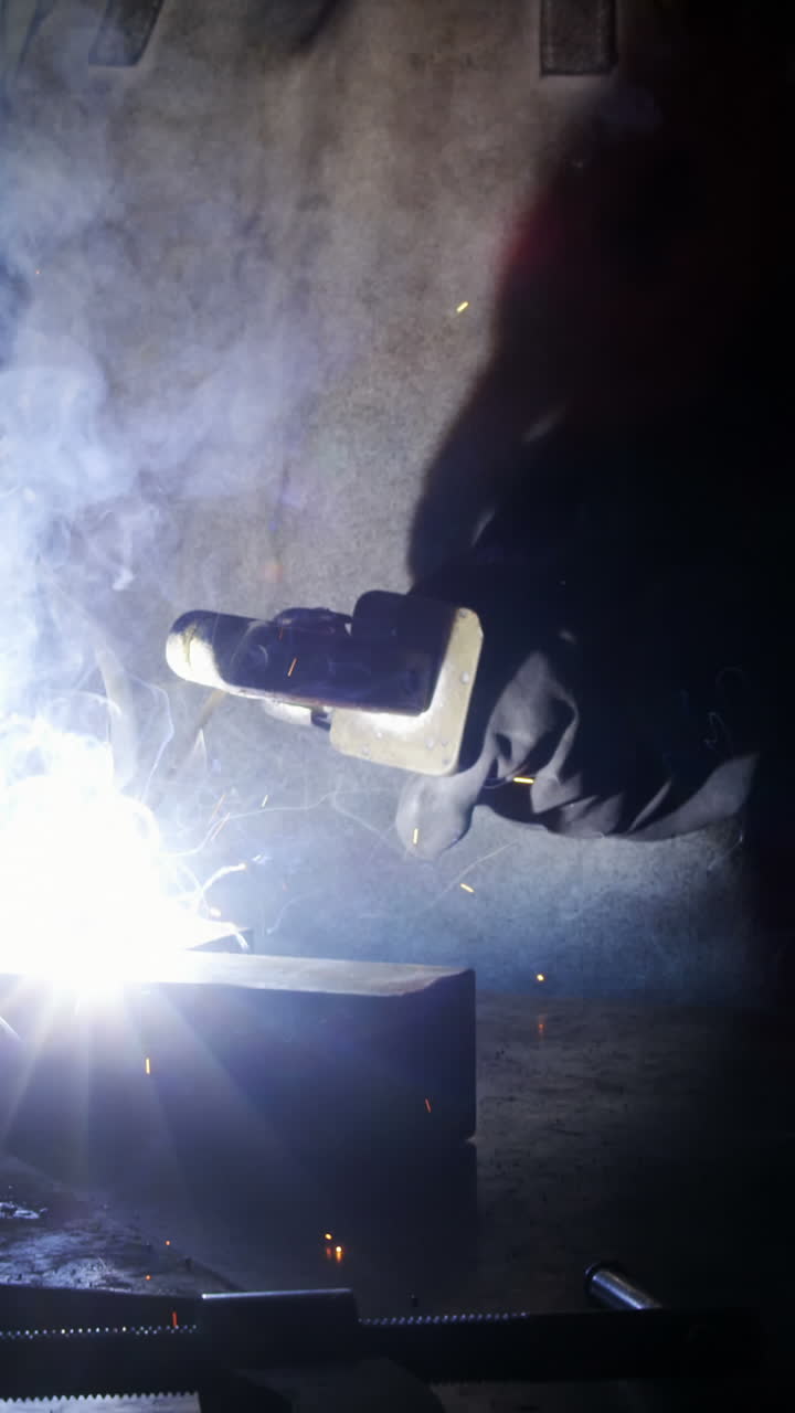 Welder welding a metal