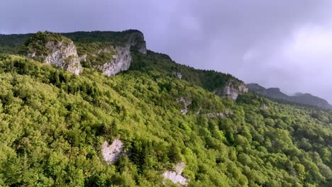 aerial tilt up grandfather mountain from linville nc