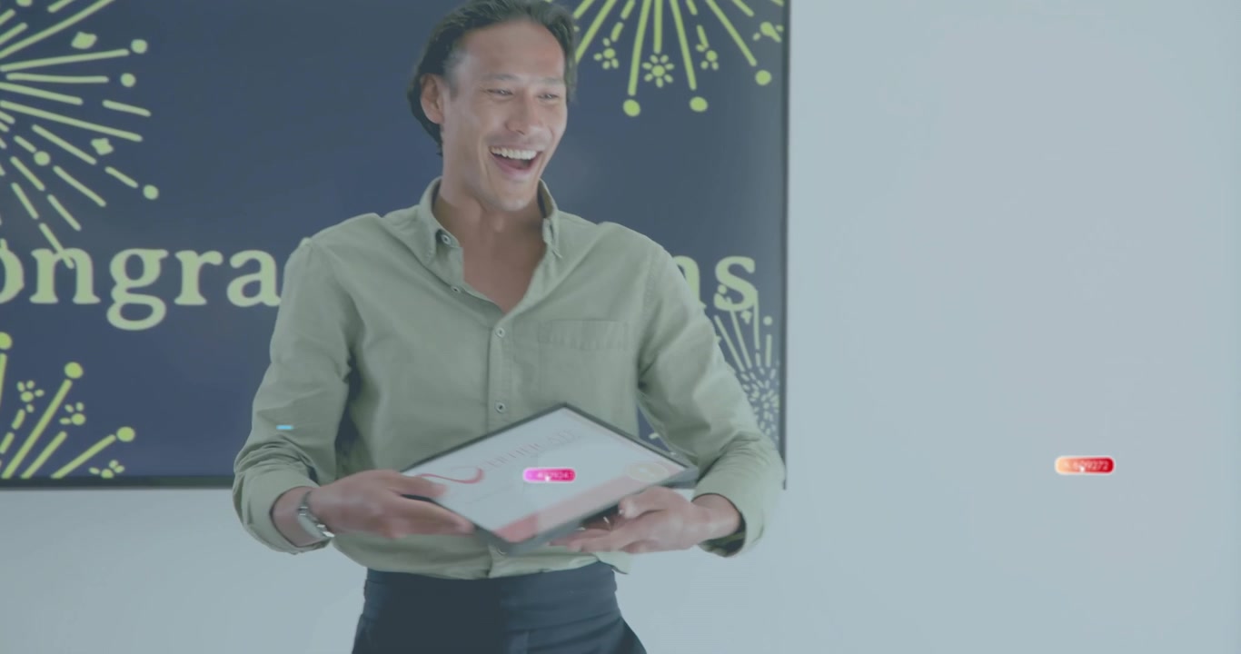 Mid adult man reacting to animated icons then presenting award for business recognition