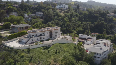 4k aerial of hillside mansion and surrounding homes in studio city california.