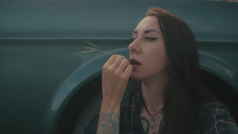 woman near a vintage truck