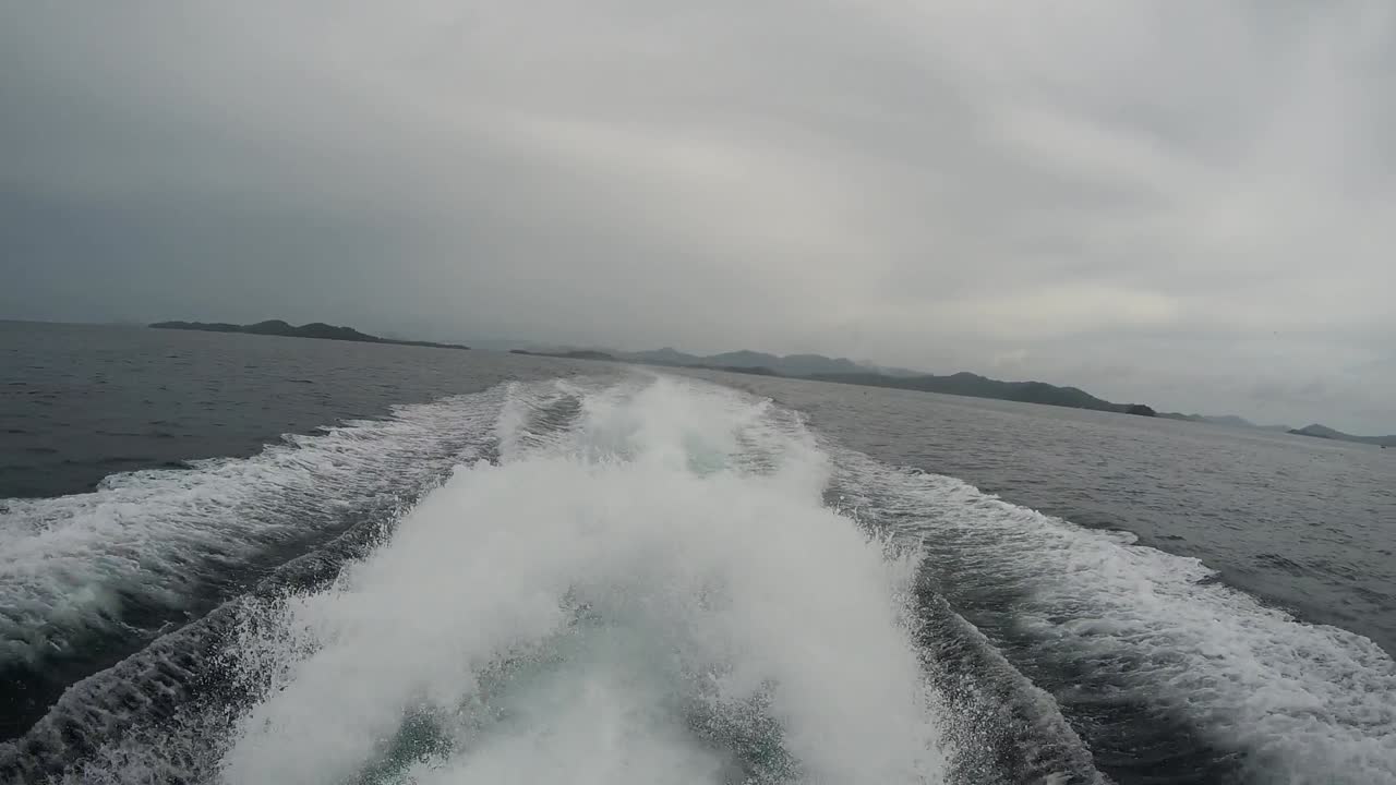In back of speedboat while driving