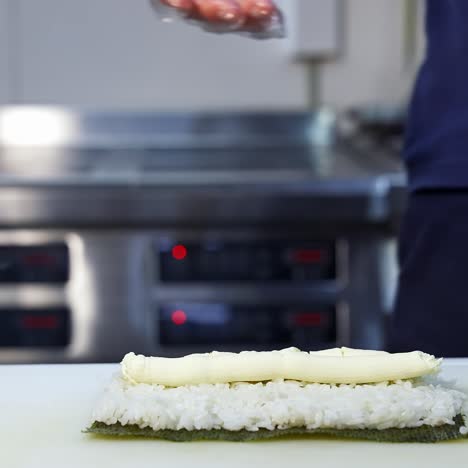 making sushi at restaurant
