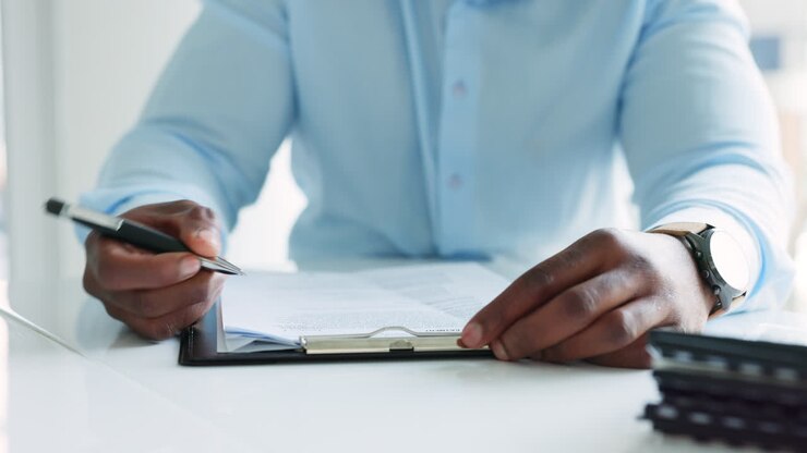 Writing, hands and paper work with a man applying