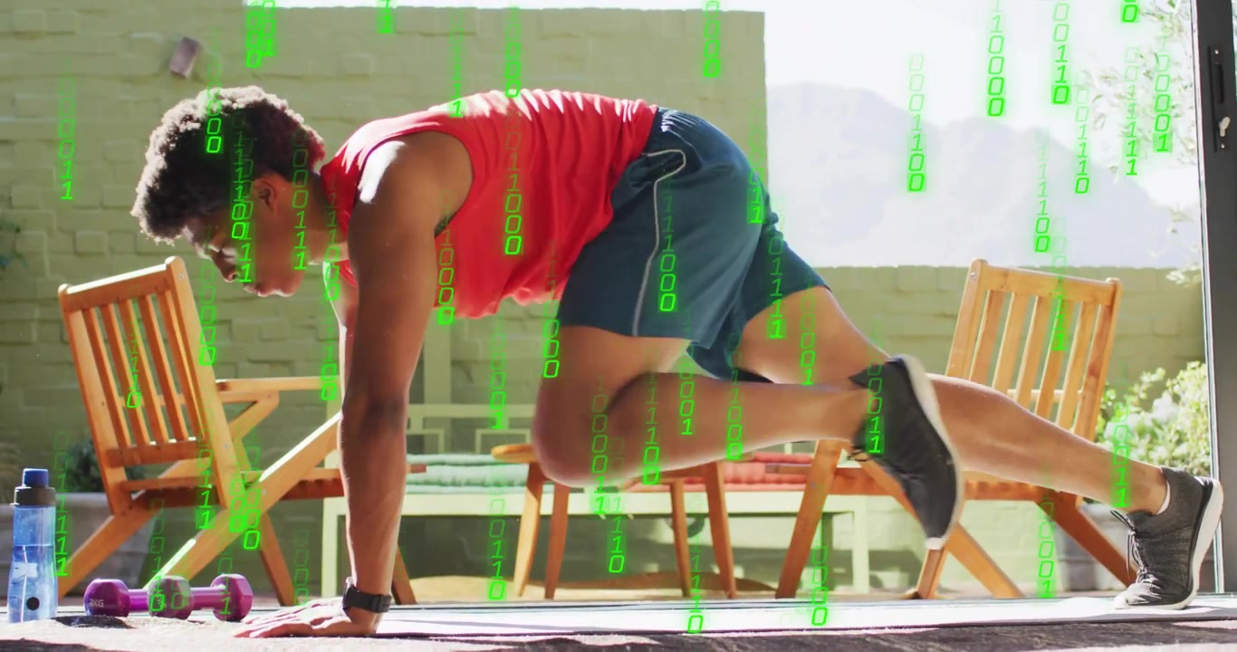 Fitness trainer performing mountain climbers after plank under code graphics boosting core strength