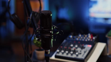 Close-up-shot-of-professional-microphone-used-to-record-podcast-conversations