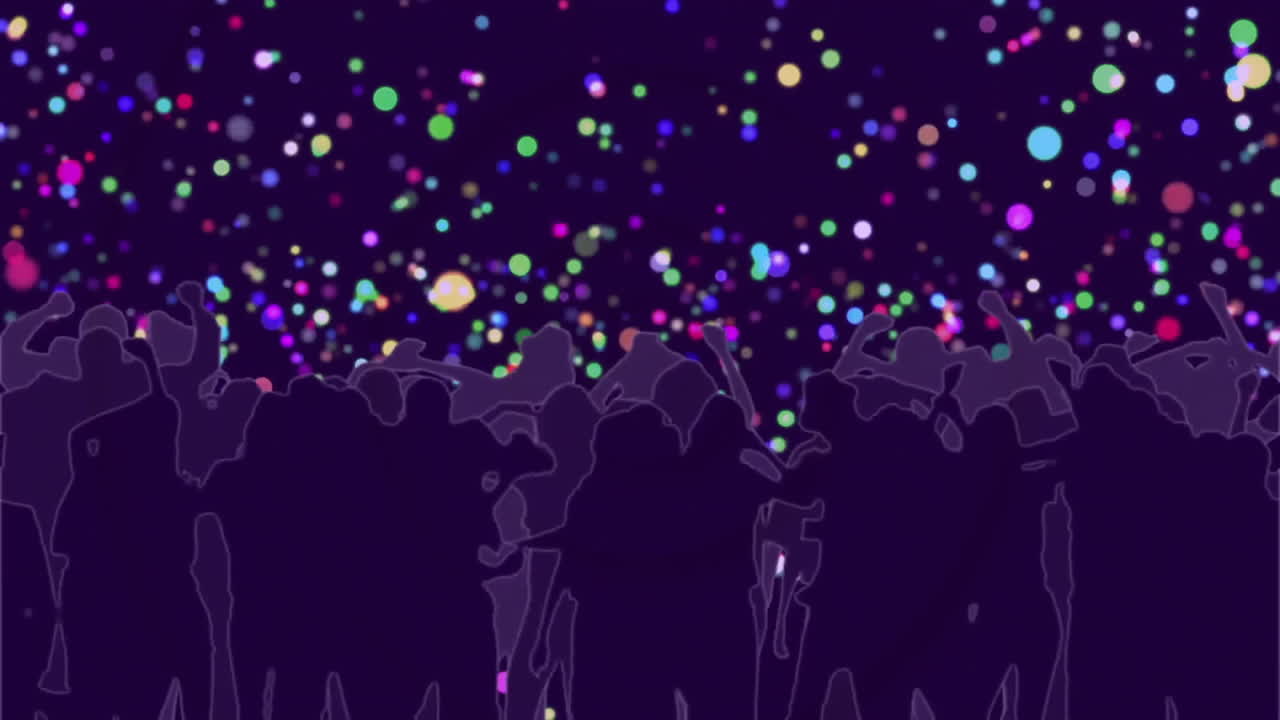Colorful particles floating over crowd enjoying concert