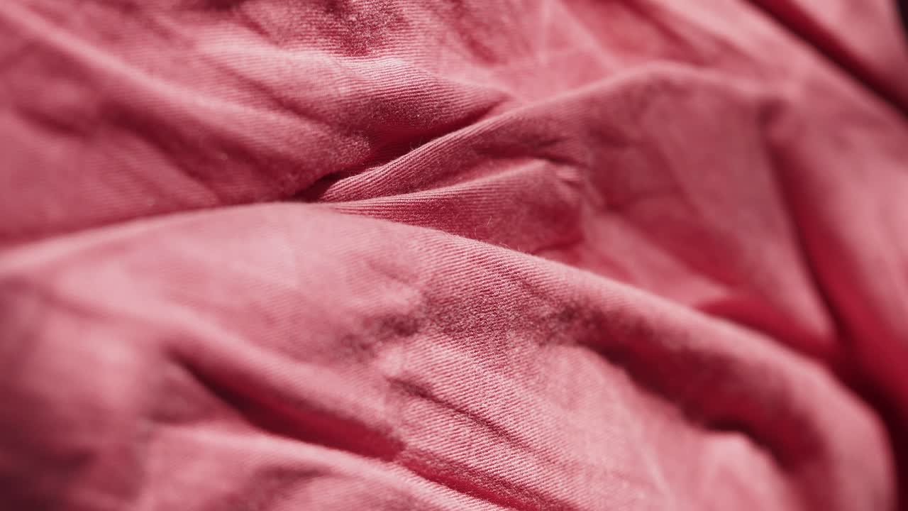 Closeup of pink fabric folds