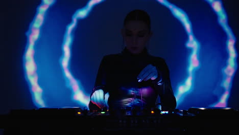 woman dj performing in a nightclub