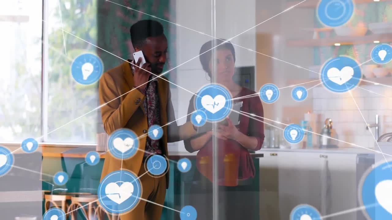 Network of digital icons on diverse businessman and businesswoman using electronic devices at office