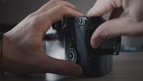 putting on a sd card on a dslr