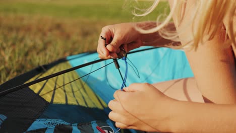 smiling caucasian child playing with kite on the beach in white clothes. high quality 4k footage
