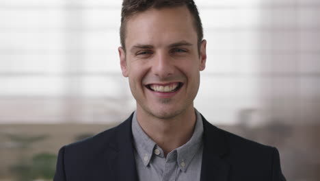 close-up-young-attractive-man-portrait-of-successful-business-entrepreneur-laughing-cheerful-looking-at-camera-enjoying-professional-lifestyle