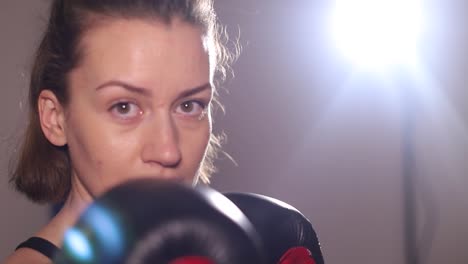 young woman learning boxing in the gym young woman learning boxing in the gym woman boxing in the gym fighting with the shadow boxing concept