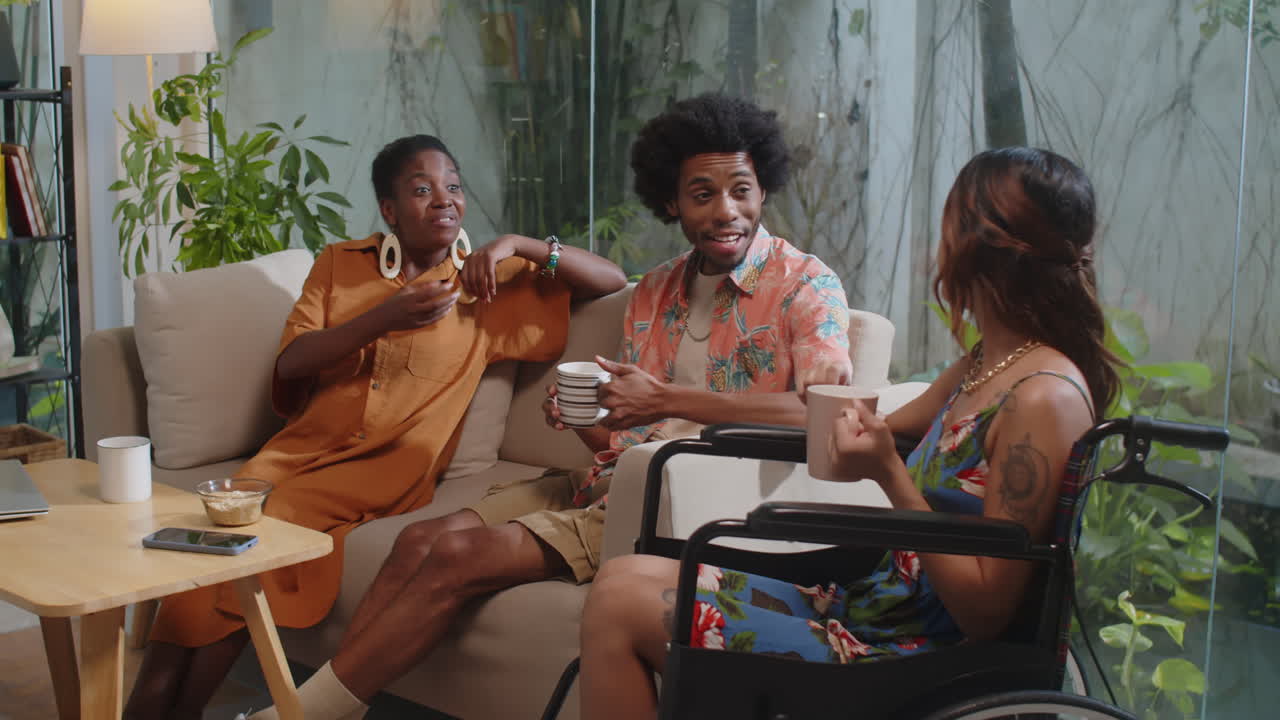 Woman in Wheelchair Gathering at Home with Friends