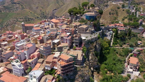 view of castelmola village, near taormina, italy