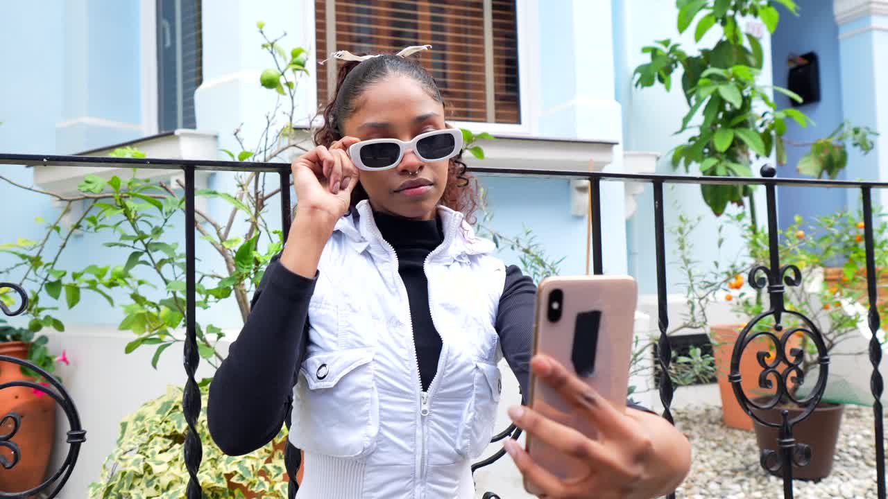 Stylish Woman Takes Selfie Outdoors