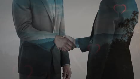 animation of social media heart icons over business handshake
